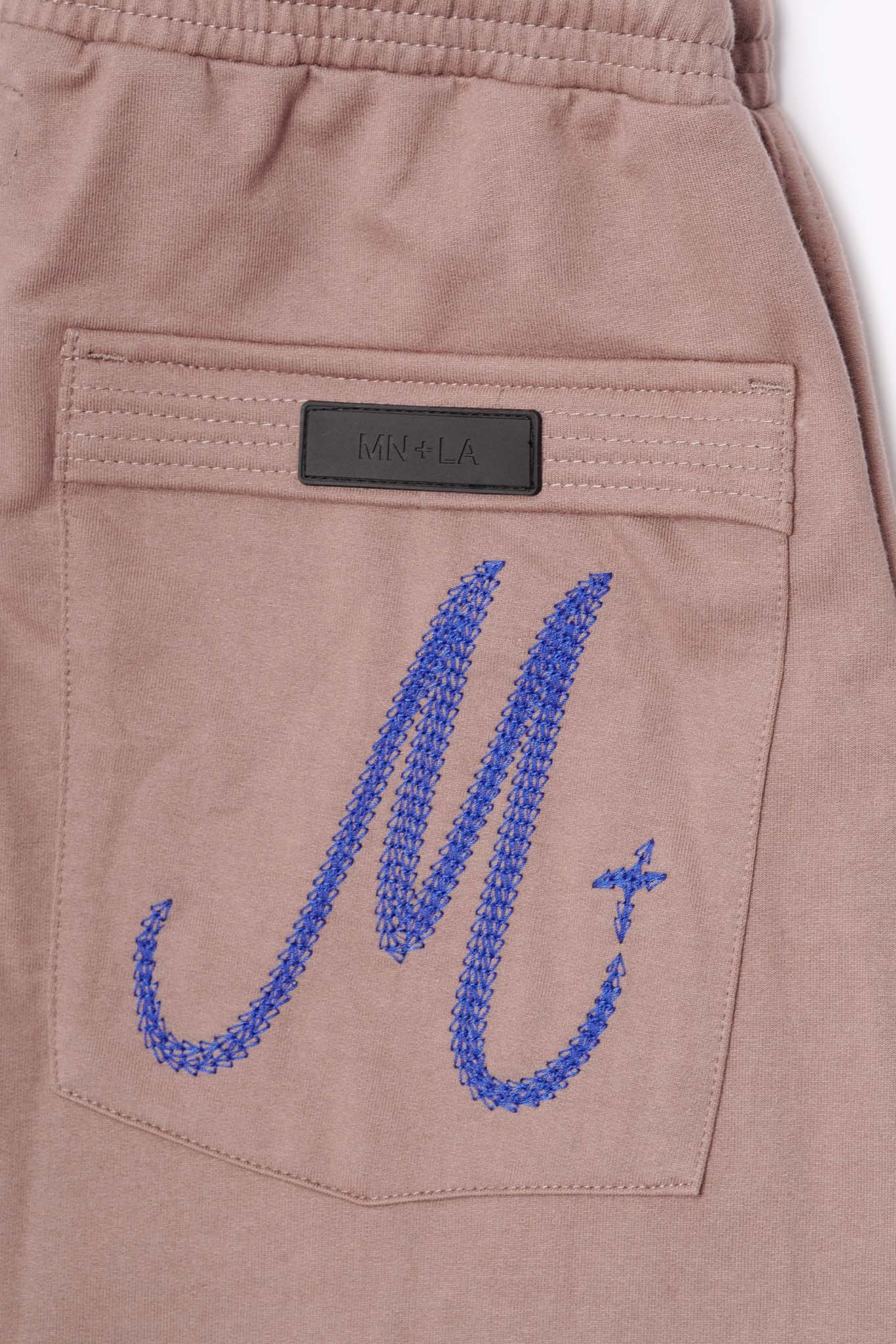 M+ BOOTCUT PANTS IN MAUVE