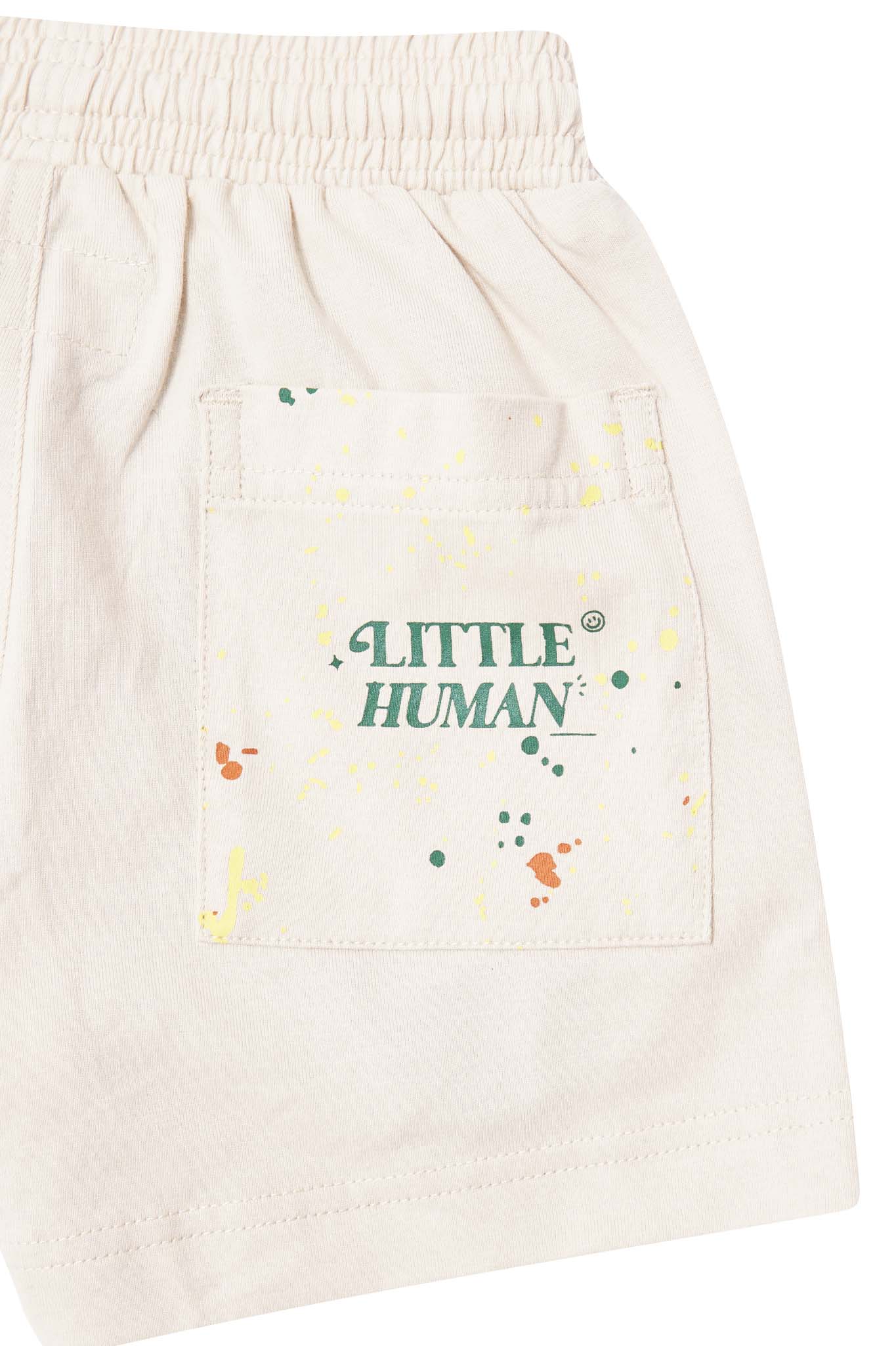 "PAINT SPLAT" LITTLE HUMAN™ PLEATED SHORTS IN OAT