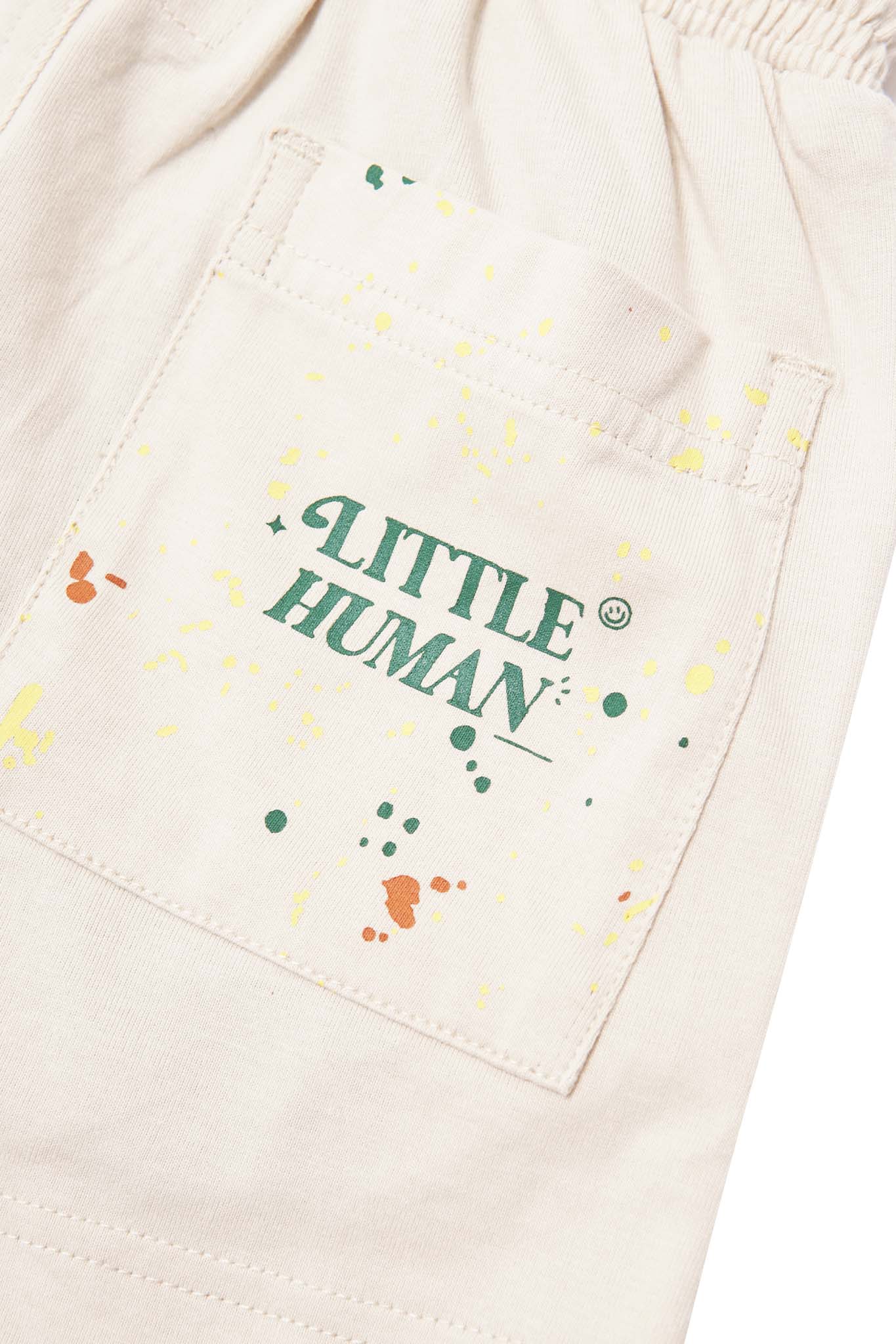 "PAINT SPLAT" LITTLE HUMAN™ PLEATED SHORTS IN OAT