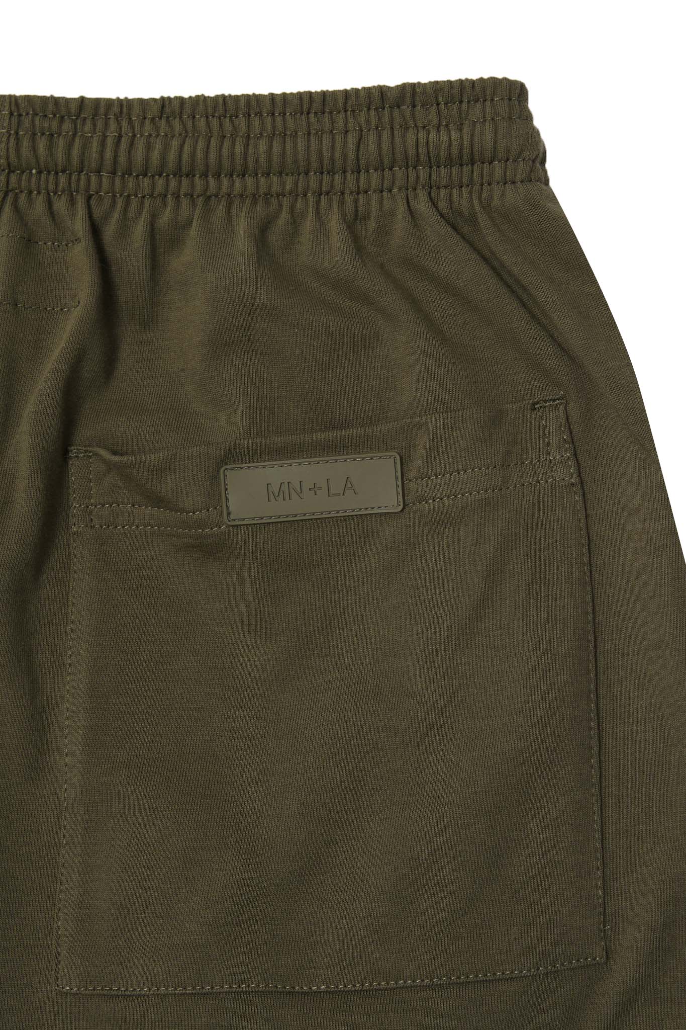 PLEATED HOUSE SHORTS IN DARK MOSS