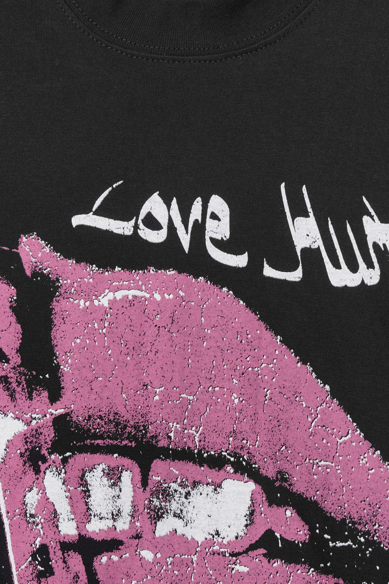 "LOVE HURTS" TEE IN CAVIAR