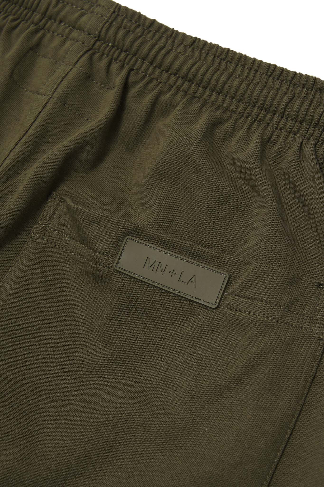 PLEATED HOUSE SHORTS IN DARK MOSS