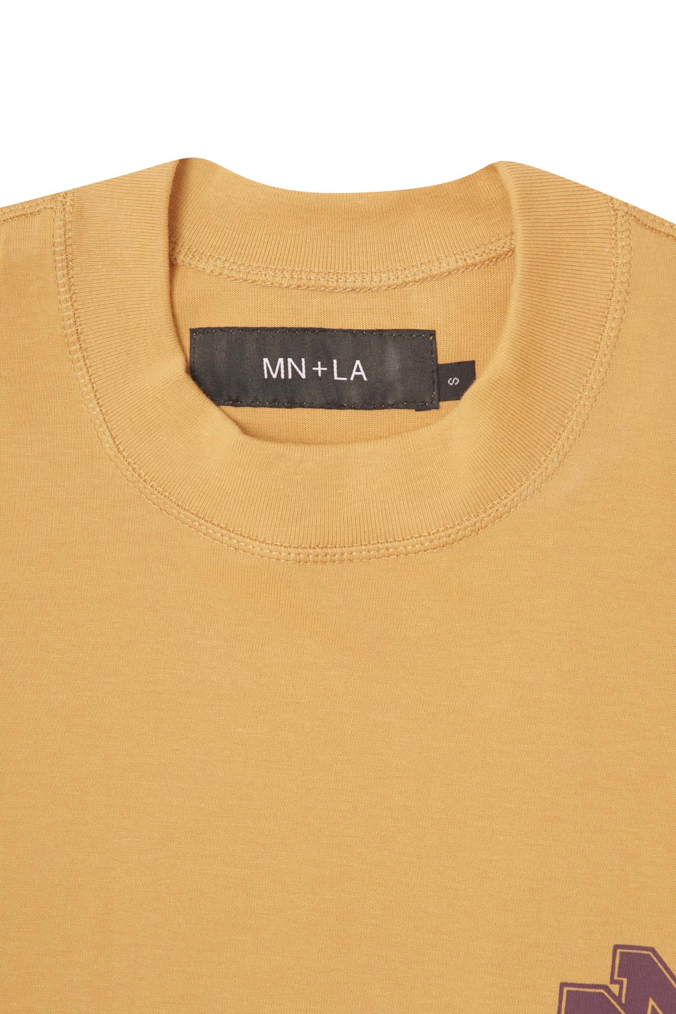 M'$ UNIVERSITY V2 TEE IN MUSTARD