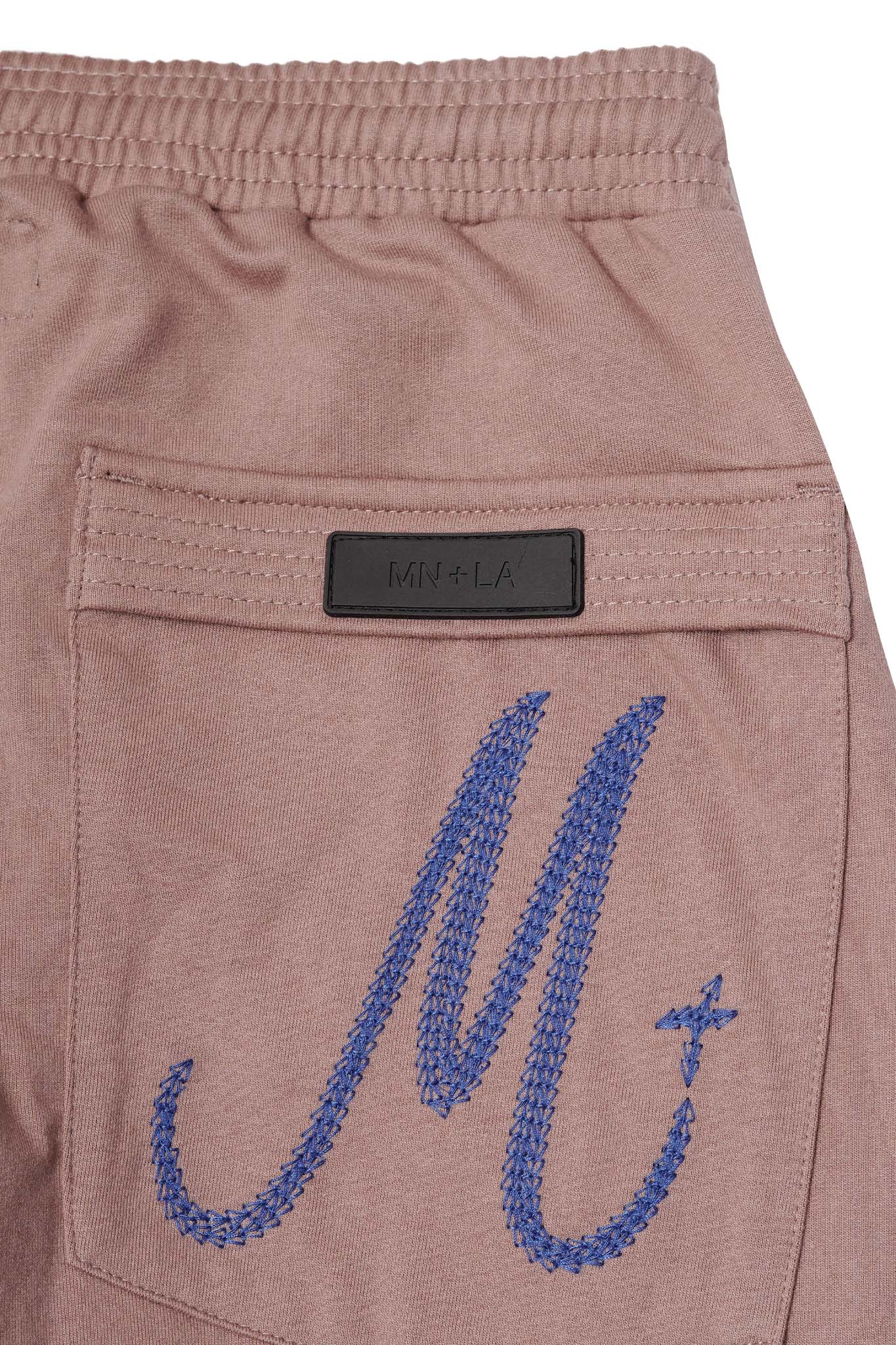 M+ BOOTCUT PANTS IN MAUVE