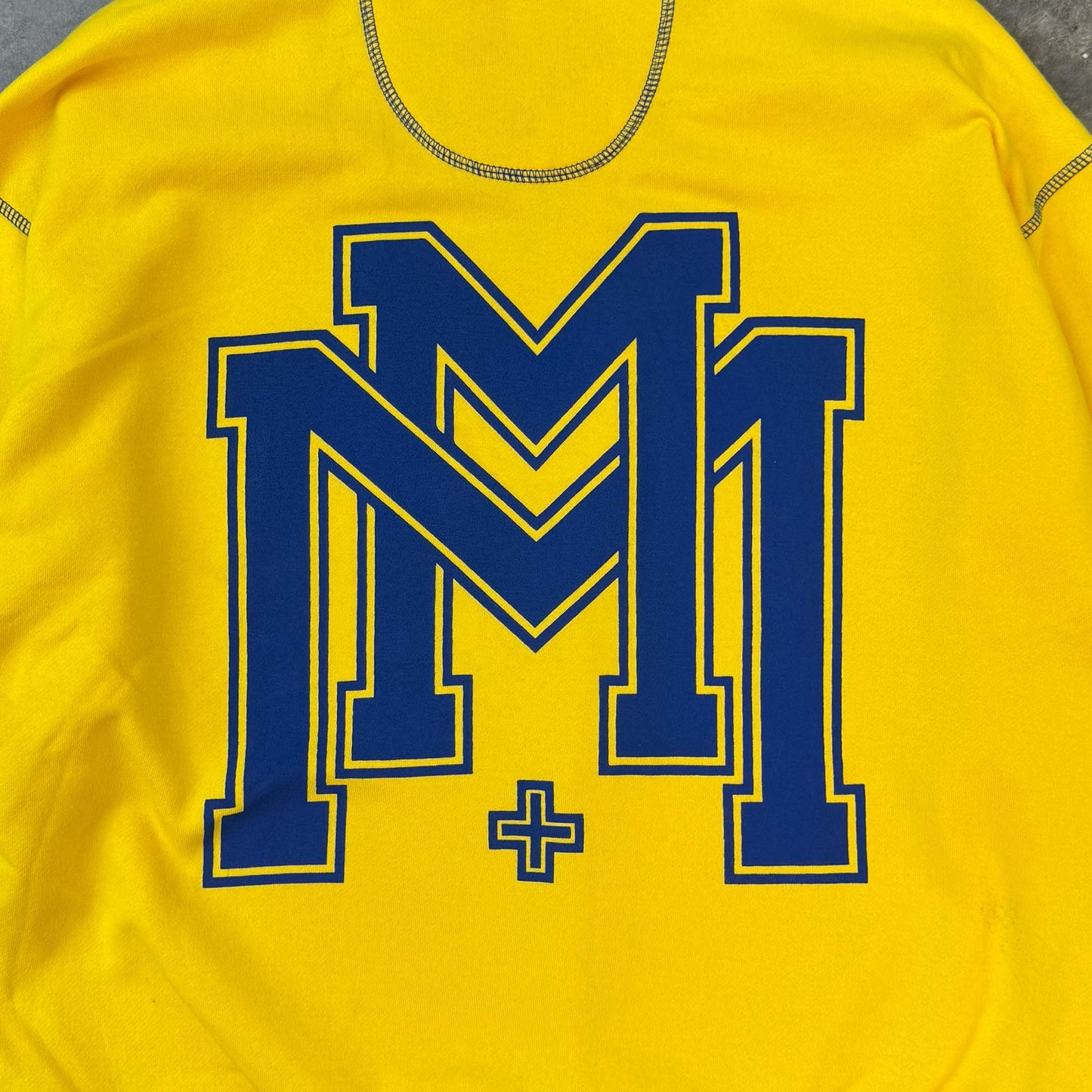 M'$ UNIVERSITY V2 IN CANARY YELLOW