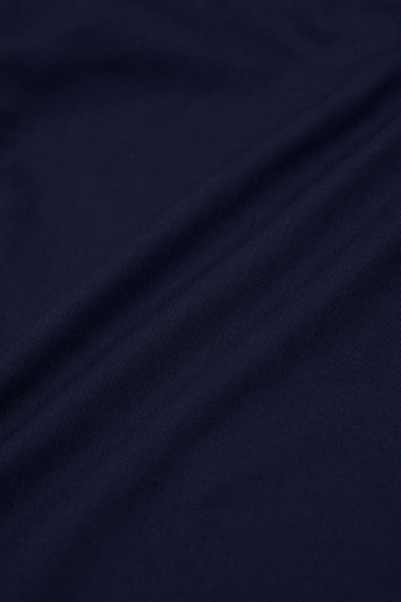 PLEATED WIDE CROPPED PANTS IN NAVY