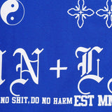 "TAKE NO SHIT, DO NO HARM" TEE IN ELECTRIC BLUE