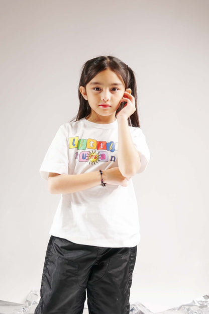 "SUN IS OUT" LITTLE HUMAN™ TEE IN WHITE