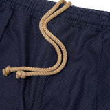 PLEATED BOOTCUT PANTS IN HAGUE BLUE