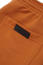 PLEATED WIDE LOUNGE PANTS IN TANGERINE