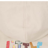 "CRAYONS" LITTLE HUMAN™ HOODIE IN OAT