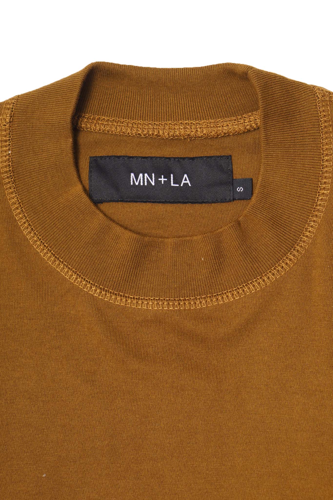 "CROP CIRCLES" MOCK NECK TEE IN RUST