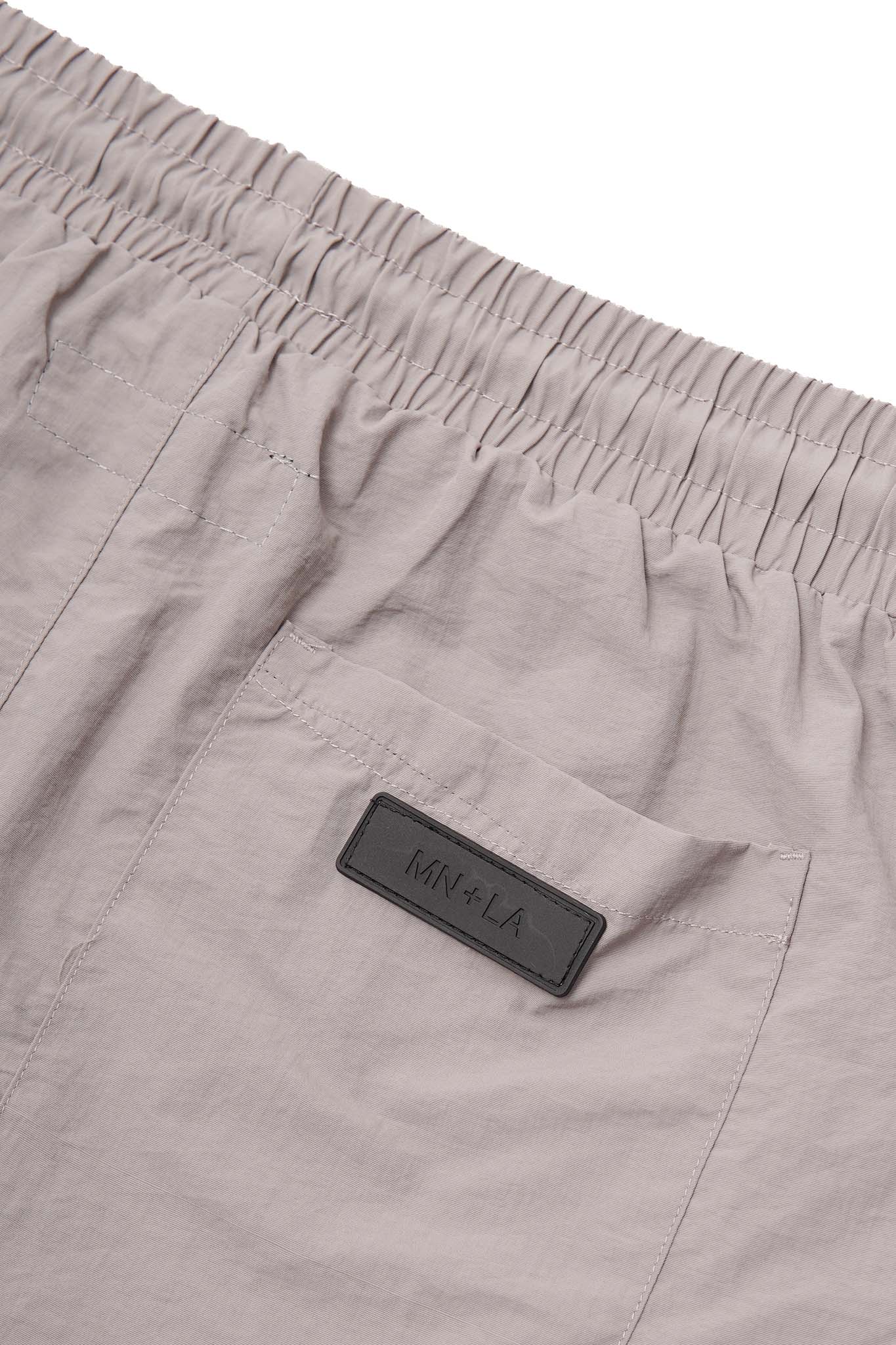 SOLAR SHORTS IN STONE GREY