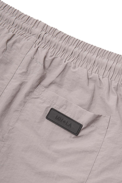 SOLAR SHORTS IN STONE GREY