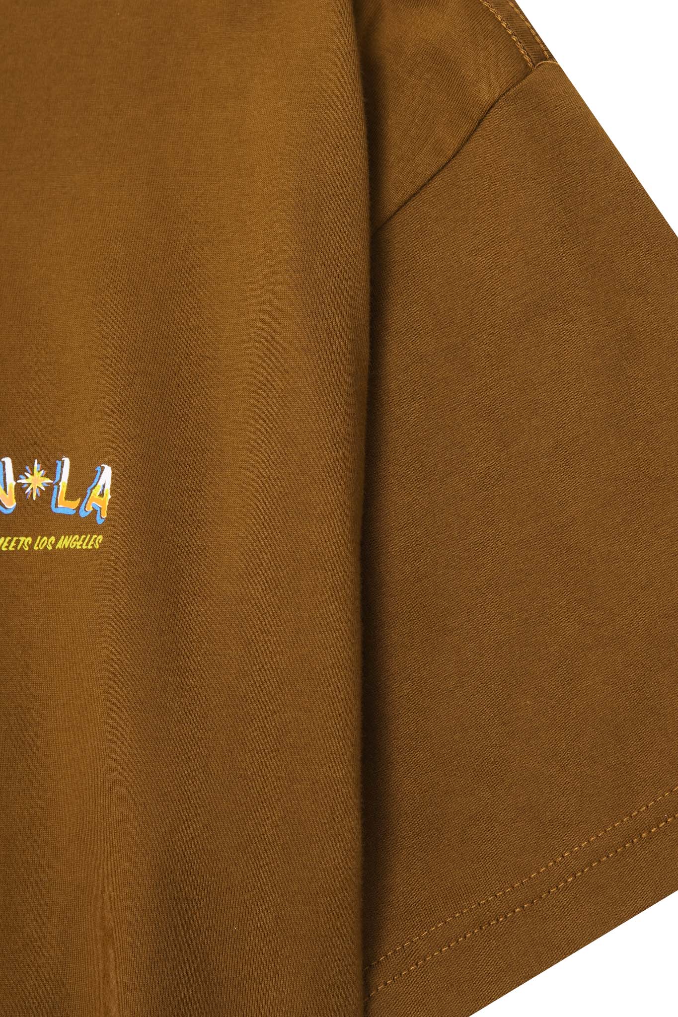 "GOLDEN COAST" TEE IN RUST