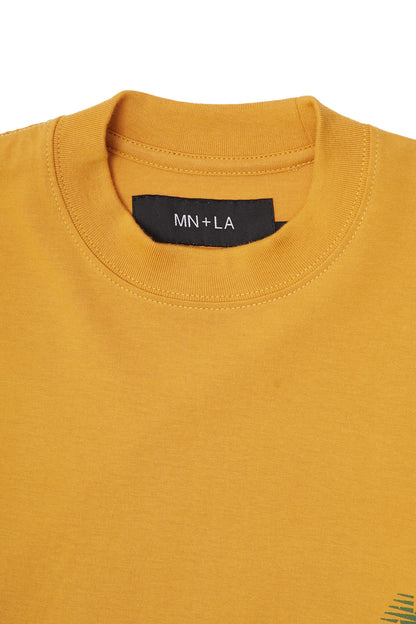"OUTDOOR EXPLORATION" MULTI LOGO TEE IN MUSTARD