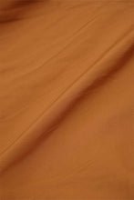 PLEATED HOUSE SHORTS IN SAFFRON