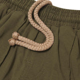 "PAINT SPLAT" LITTLE HUMAN™ PLEATED SHORTS IN OLIVE