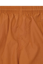 PLEATED HOUSE SHORTS IN SAFFRON
