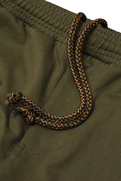 M+ BOOTCUT PANTS IN OLIVE