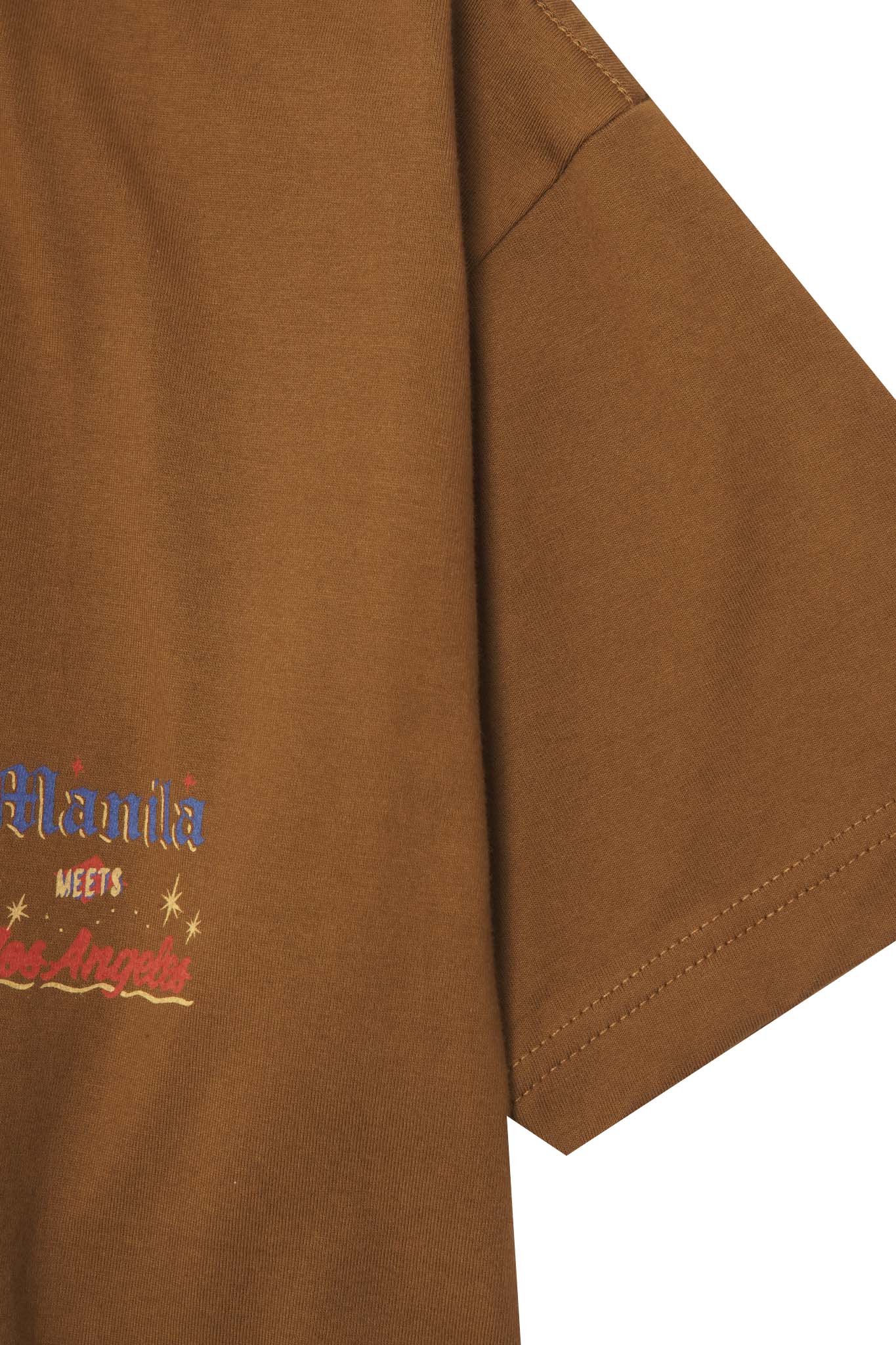 "MIDNIGHT MAGIC" TEE IN RUST
