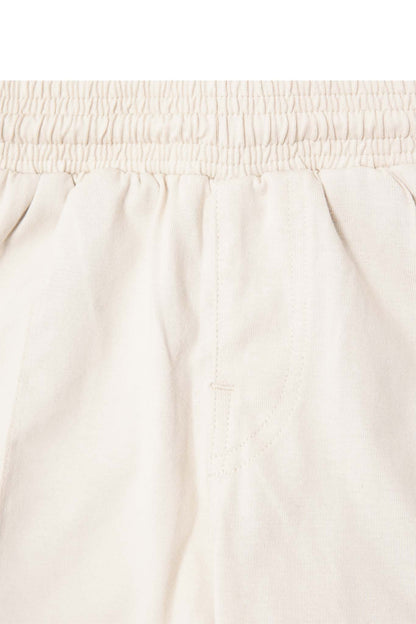 "PAINT SPLAT" LITTLE HUMAN™ PLEATED SHORTS IN OAT