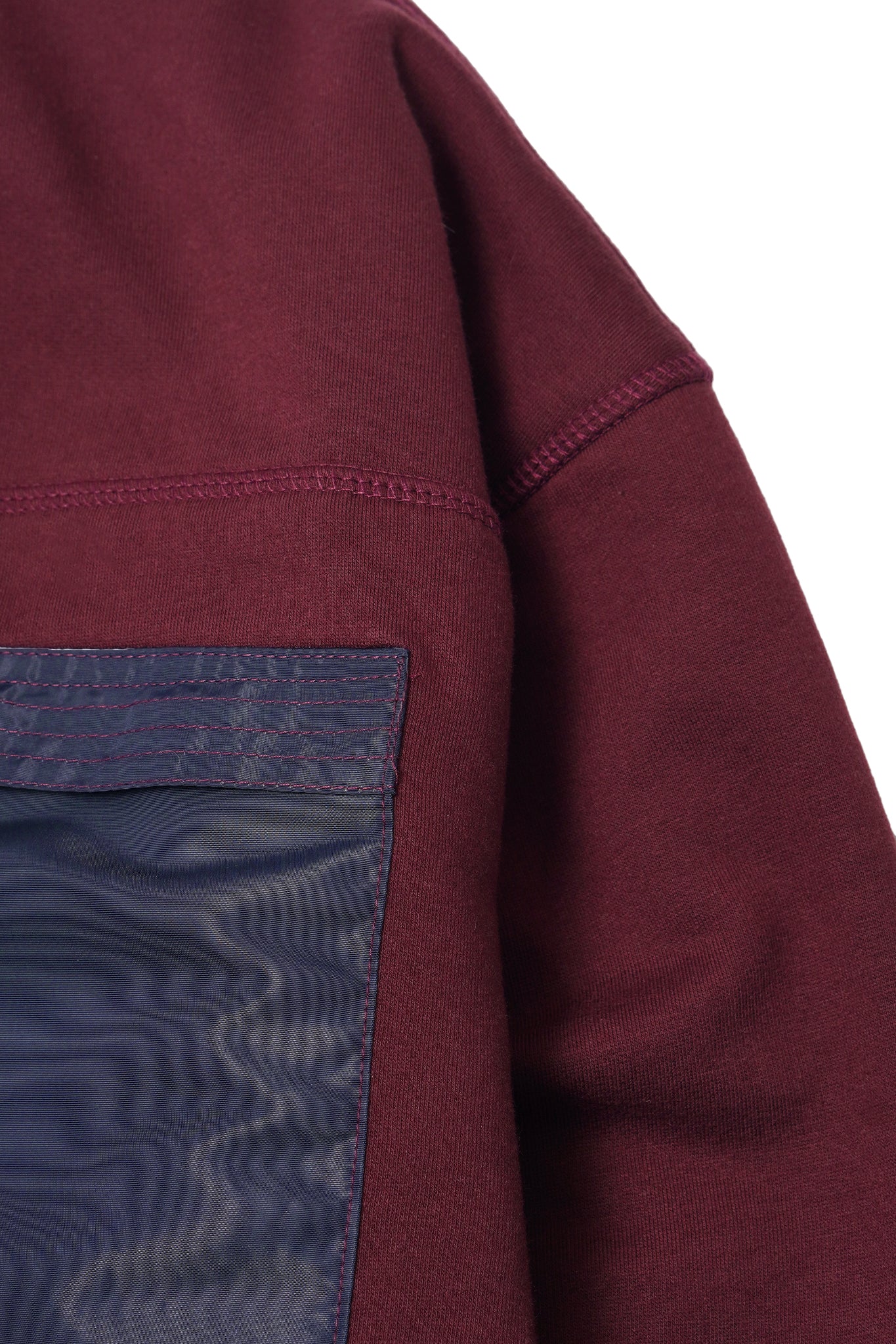 NEEDLEWORK CARDIGAN IN WINE