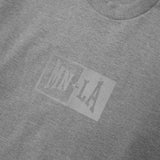 "KNUCKLEHEAD" TEE IN HEATHER GREY REFLECTIVE