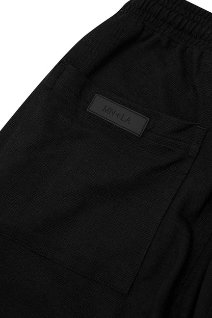 WAFFLE WEAVE PLEATED WIDE PANTS IN CAVIAR