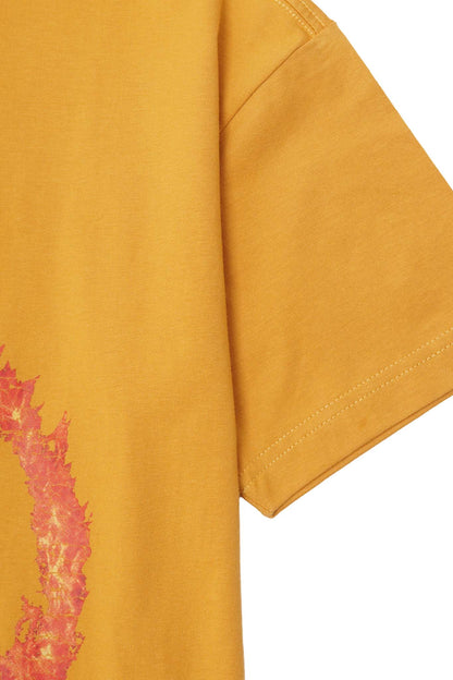 "BURN IN PEACE" TEE IN MUSTARD
