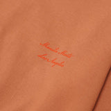 MN+LA™ SCRIPT LOGO TEE IN APRICOT