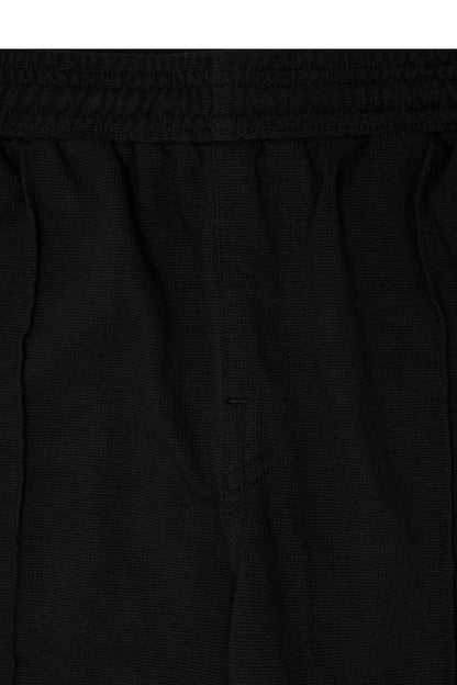 WAFFLE WEAVE PLEATED WIDE PANTS IN CAVIAR