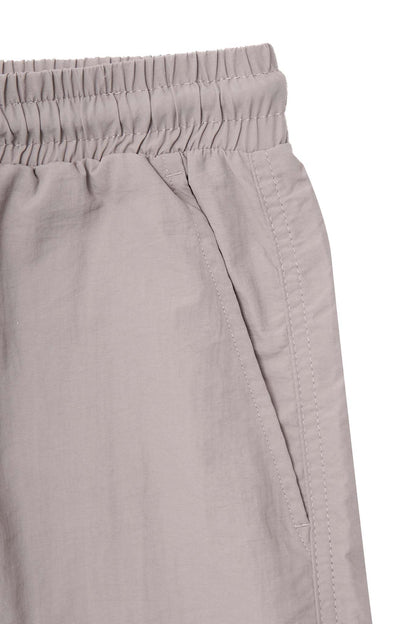 SOLAR SHORTS IN STONE GREY