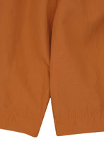 PLEATED HOUSE SHORTS IN SAFFRON