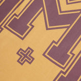 M'$ UNIVERSITY V2 TEE IN MUSTARD