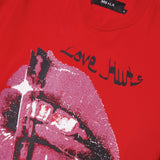 "LOVE HURTS" TEE