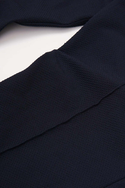 PLEATED BOOTCUT PANTS IN HALE