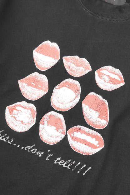 "KISS...DON'T TELL" TEE IN CAVIAR