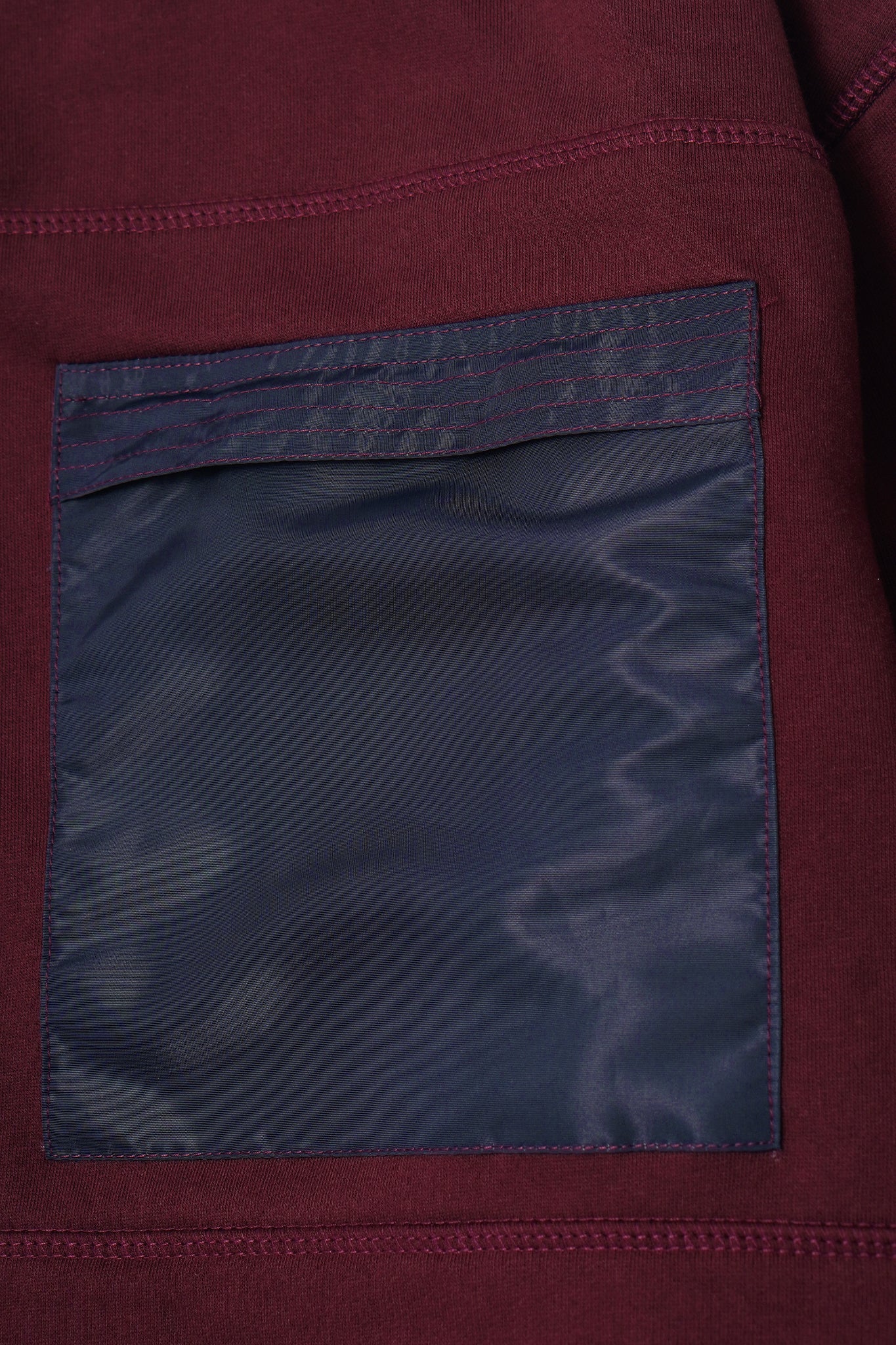 NEEDLEWORK CARDIGAN IN WINE