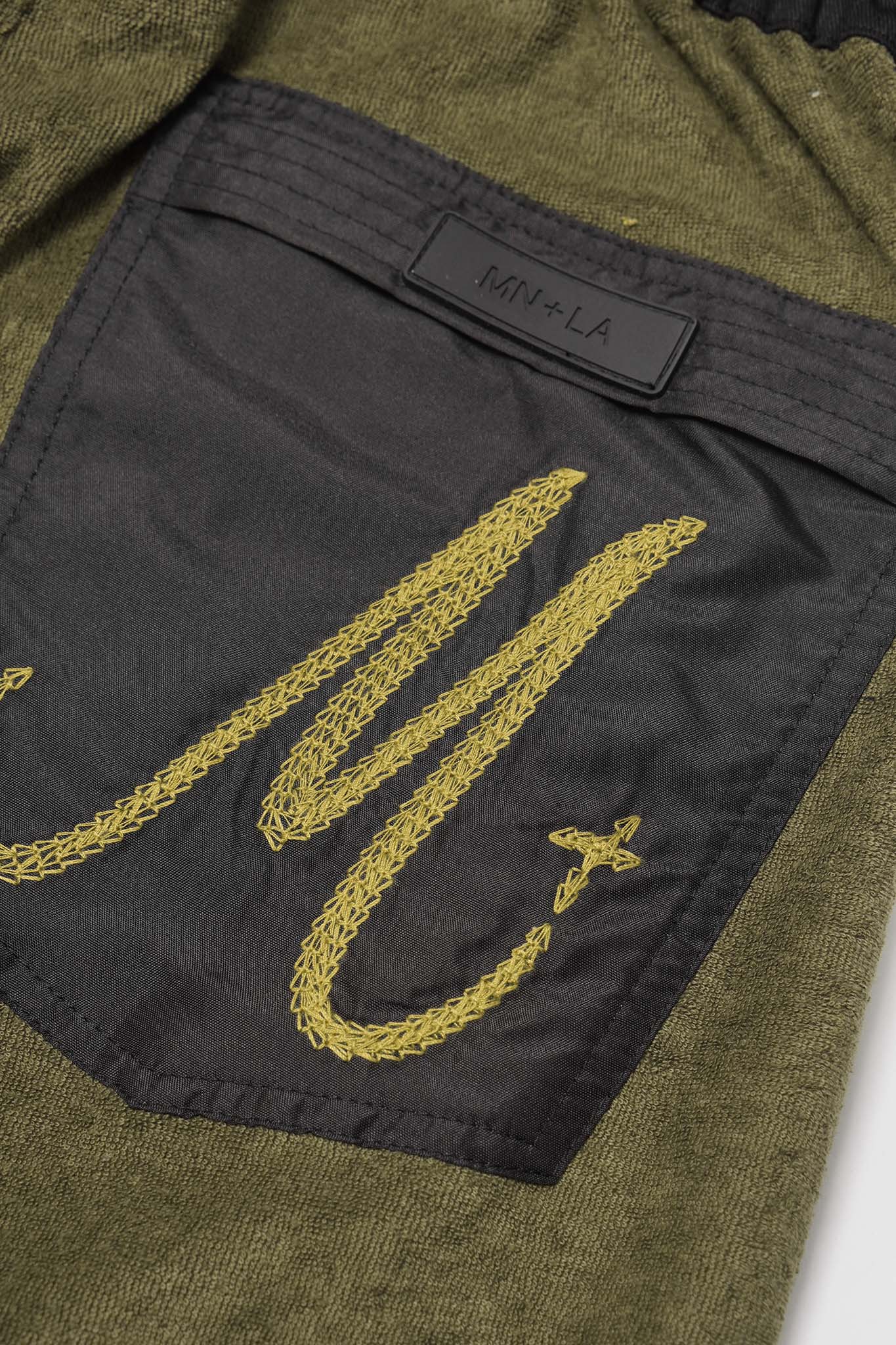M+ TOWEL BOOTCUT PANTS IN OLIVE