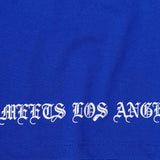 "TAKE NO SHIT, DO NO HARM" TEE IN ELECTRIC BLUE