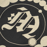 "CROP CIRCLES" MOCK NECK TEE IN CAVIAR/BONE