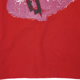 "LOVE HURTS" TEE