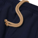 PLEATED CROPPED PANTS IN NAVY