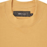 M'$ UNIVERSITY V2 TEE IN MUSTARD