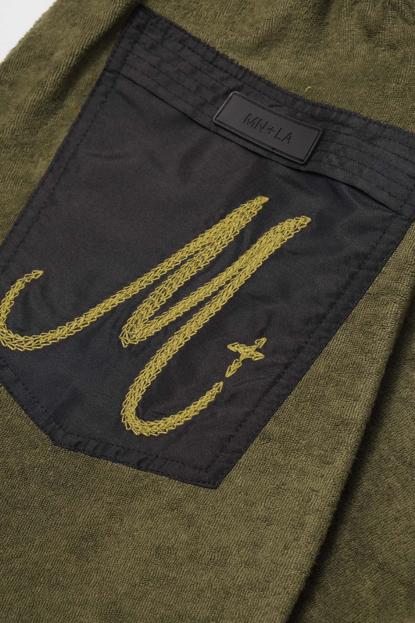 M+ TOWEL BOOTCUT PANTS IN OLIVE