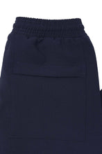 PLEATED CROPPED PANTS IN NAVY