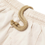 "PAINT SPLAT" LITTLE HUMAN™ PLEATED SHORTS IN OAT