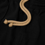 WAFFLE WEAVE PLEATED WIDE PANTS IN CAVIAR