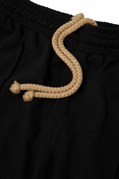 WAFFLE WEAVE PLEATED WIDE PANTS IN CAVIAR